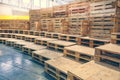 Many empty pallets stored in warehouse