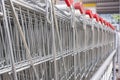 Many empty shopping carts in a row. Royalty Free Stock Photo