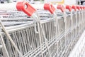 Many empty shopping carts in a row. Royalty Free Stock Photo