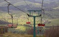 Many empty ski lift chairs in a row close up in the summer Royalty Free Stock Photo