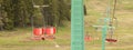 Many empty ski lift chairs in a row close up in the summer Royalty Free Stock Photo