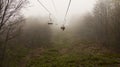 Many empty ski lift chairs in a row close up in the summer Royalty Free Stock Photo