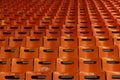 Empty brown chairs on stadium, 80s style, pattern