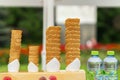 Many empty wafer sweet cornets for ice cream on naturale green blurry background. Selective focus. Copy space. Real