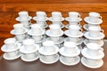 Many Empty White Tea Or Coffee Cups Stacked On Table. Event Catering Service Royalty Free Stock Photo