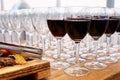Many empty wine glasses and glasses with red wine Royalty Free Stock Photo