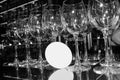 Many empty wine glasses and glasses with white wine Royalty Free Stock Photo