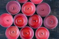 Many extinguished red candles closeup Royalty Free Stock Photo