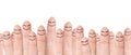 Many fingers with drawn faces