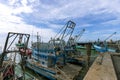 Many fishing boats are docking at the sea in Chon Buri Province