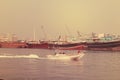 Many fishing boats float on the sea with sky background.,Dubai 28 July 2017