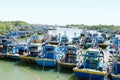 Many fishing boats at river port in Vietnam Royalty Free Stock Photo