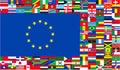 Many flags of different countries of the world are located in the form of a frame with a large European Union flag in the center Royalty Free Stock Photo