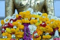 Many flowers in front of budha Royalty Free Stock Photo
