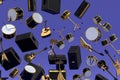 Many of flying acoustic guitars, drums, cymbal and amplifier on violet Royalty Free Stock Photo