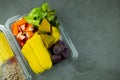 Many of fresh chopped fruits and vegetable for eating healthy salad in plastic box. Royalty Free Stock Photo