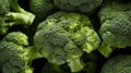 many fresh green head of broccoli on a dark background, close-up, top view. Generative AI Royalty Free Stock Photo