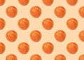 Many fresh ripe grapefruits on beige background. Seamless pattern design