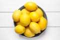 Many fresh ripe lemons on white wooden table, top view Royalty Free Stock Photo