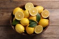 Many fresh ripe lemons on wooden table, above view Royalty Free Stock Photo