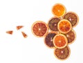 Many fresh slices of blood oranges lie beautifully arranged on a white background Royalty Free Stock Photo