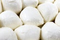 Many fresh white mozzarella cheese balls close up. Royalty Free Stock Photo