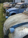 Many fronts of old vintage cars old grunge scratched dirty rusty vintage