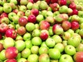 Many fruits green apples lying in supermarket