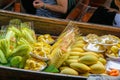 Many fruits  on long-tail boat with floating market, Damnoen Saduak floating market in Ratchaburi near Bangkok, Thailand Royalty Free Stock Photo