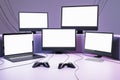 Many gaming TV and computer screens and joysticks on purple backdrop. Video games concept. Mock up