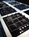 Many gas stoves for kitchen. Diagonal view coseup Royalty Free Stock Photo