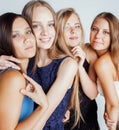 Many girlfriends hugging celebration on white background, smiling talking chat close up