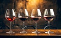 many glass of red wine on rustic wooden table. Wine tasting. Wine card, rastaurant menu Royalty Free Stock Photo