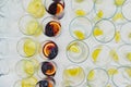 Many glasses of drinks in a row ready to be filled with alcohol, decorated with slices of lemons Royalty Free Stock Photo