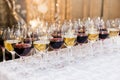 Many glasses with white and red wine on buffet table Royalty Free Stock Photo