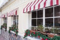 Many glittering, shiny Christmas tree balls, decoration on windows of a restaurant