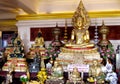 Many gold-colored Buddha statue in Buddhist temple Royalty Free Stock Photo