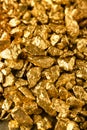 Many gold nuggets as background