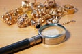 Many golden and silver jewerly and magnifying glass, pawnshop concept, jewerly shop concept Royalty Free Stock Photo