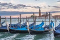 Many gondolas in Venice in Italy at sunset Royalty Free Stock Photo