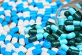 Many green and blue white capsules for health care concept Royalty Free Stock Photo
