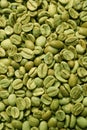 Many green coffee beans as background, top view Royalty Free Stock Photo