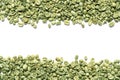 Many green coffee beans on white background, top view Royalty Free Stock Photo