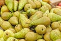 Many green pears at a famers supermarket