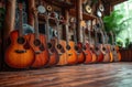 Many guitars are hanging on the wall in the music room