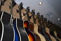 Many guitars in a row