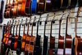 Many guitars in-store musical instruments b n Royalty Free Stock Photo