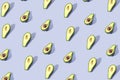 Many halves of avocado, pattern, banner. Preparation of a bright background, green mint pastel color