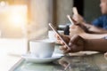 Many hand using smartphone in coffee shop