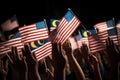 Many hands with American flags on black background, closeup. Election concept, Hand waving Malaysia flag also known as Jalur Royalty Free Stock Photo